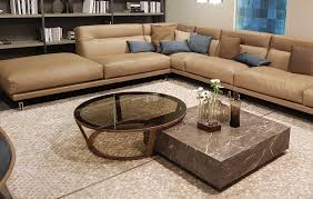 Things to consider while buying wood and glass coffee table
